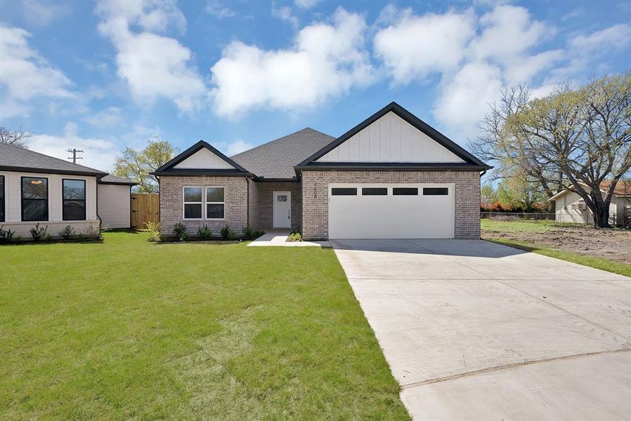 Front exterior of a new home in , The Colony, TX, highlighting curb appeal (Image 21).