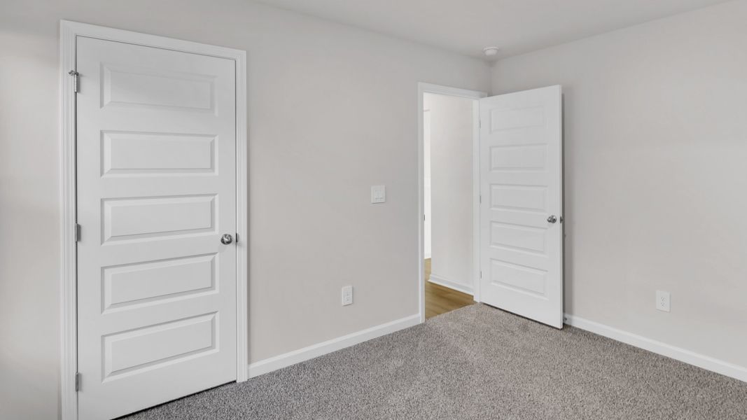 Representative unfurnished interior of a home built from the Lakeside by D.R. Horton in Bailey Park, Fayetteville (Image 28).