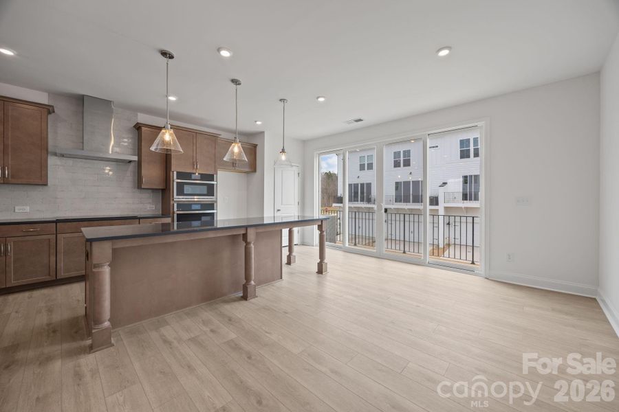 Furnished interior view inside a new home in The River District Townhomes, Charlotte (Image 3).