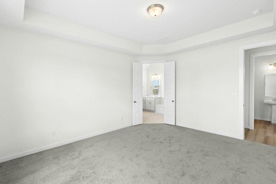 Spacious, unfurnished interior of a new home in The Colony, Bastrop (Image 23).