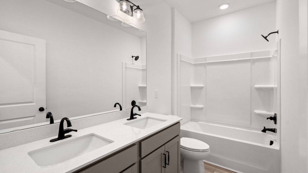 Representative furnished interior of a home built from the Easton III by DRB Homes in Bluffs at Sun Colony, Longs (Image 9).