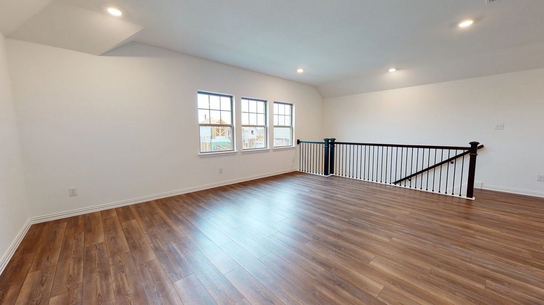 Representative unfurnished interior of a home built from the Sterling by Ashton Woods in Gateway Parks, Forney (Image 11).