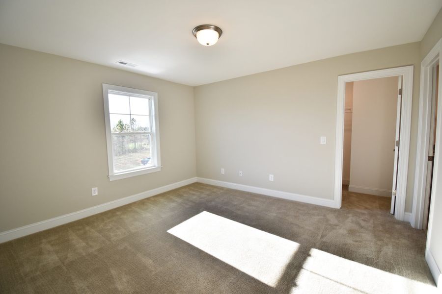 Representative unfurnished interior of a home built from the Lancaster by Keystone Homes NC in Preserve at Carriage Cove, Oak Ridge (Image 26).