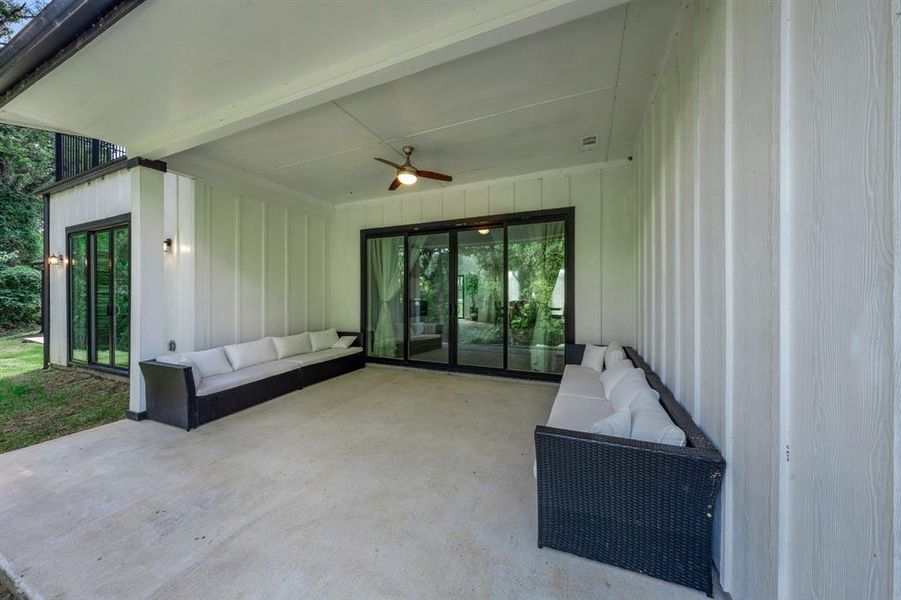 View of patio featuring an outdoor hangout area and a ceiling fan View of patio featuring an outdoor hangout area and a ceiling fan