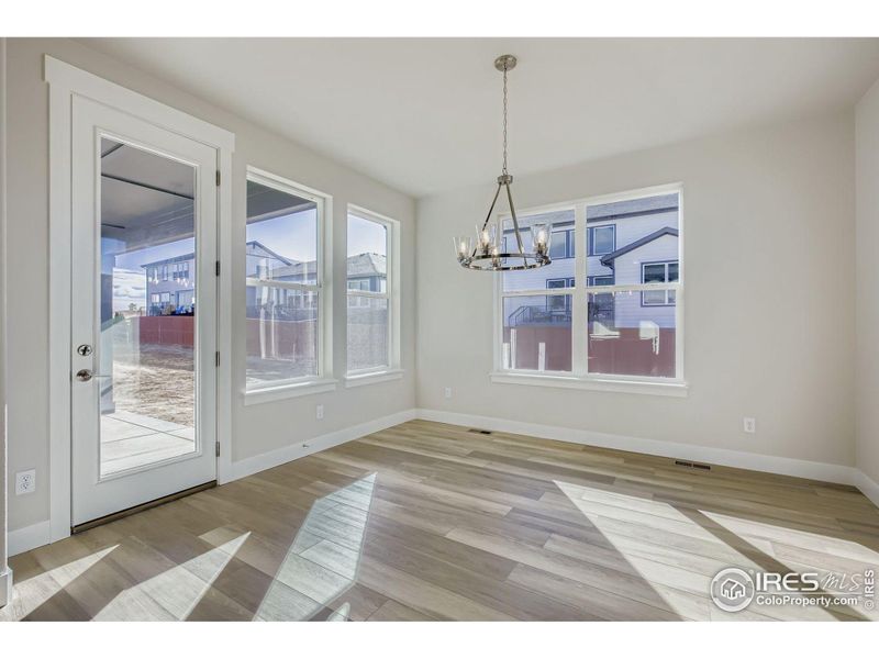 Spacious, unfurnished interior of a new home in RainDance National 60/70, Windsor (Image 14).