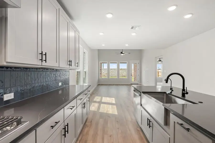 Furnished interior view inside a new home in Flora, Hutto (Image 5).