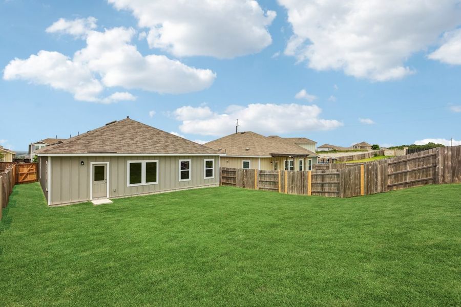 Exterior details and patio area of a home in Cloverleaf, Austin (Image 3).