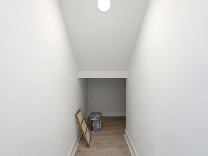 Spacious, unfurnished interior of a new home in The Coves at Lakes of Cane Bay II, Summerville (Image 18).