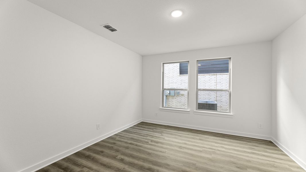 Spacious, unfurnished interior of a new home in Keeneland 50s, Aubrey (Image 18).