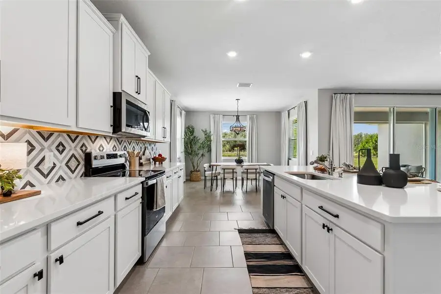 Furnished interior view inside a new home in Deerbrook, Land O' Lakes (Image 6).