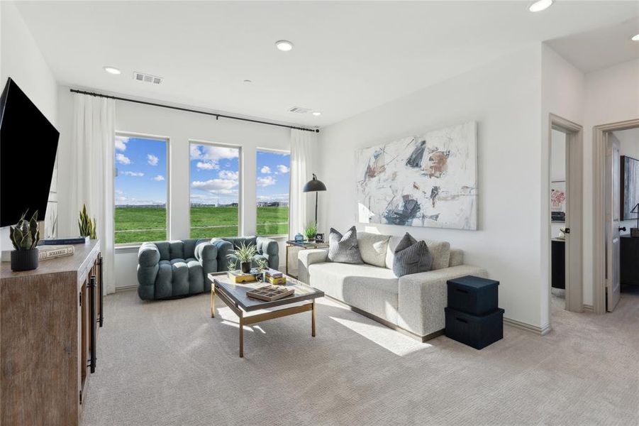 You'll enjoy hours of family fun time in this spacious, light filled game room!