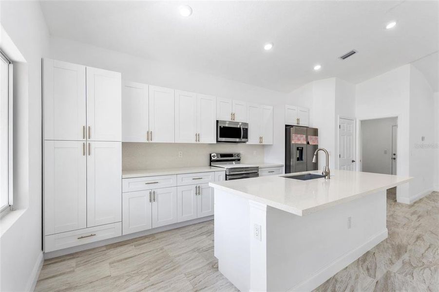 Furnished interior view inside a new home in , Indian Lake Estates (Image 11).