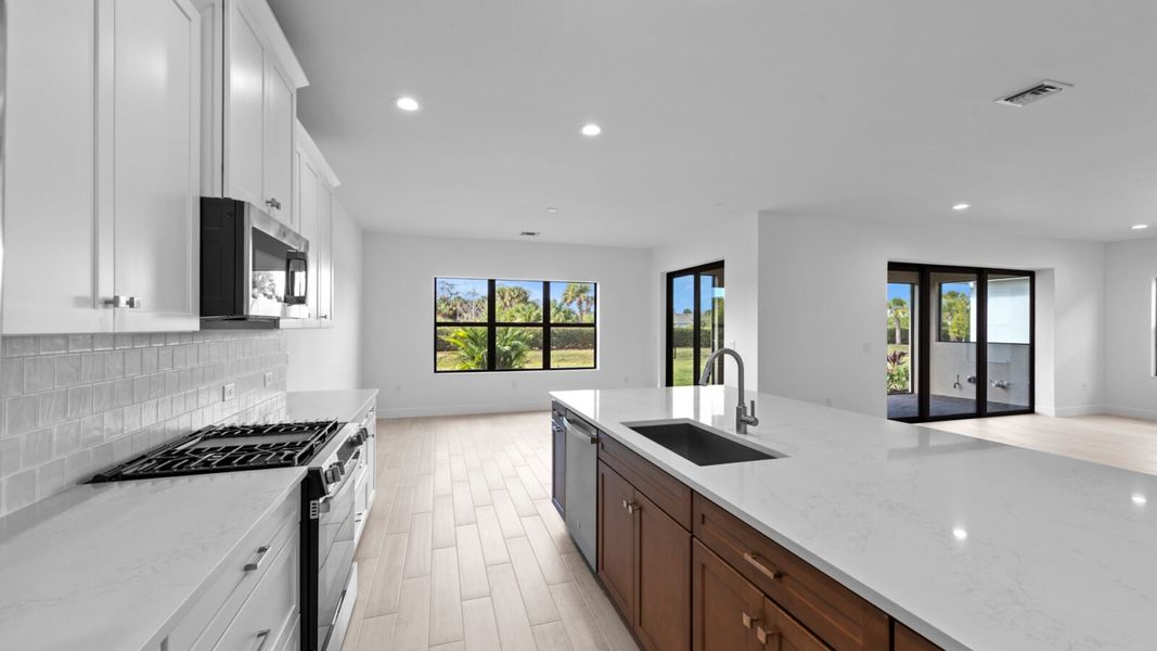 Furnished interior view inside a new home in SkySail, Naples (Image 7).