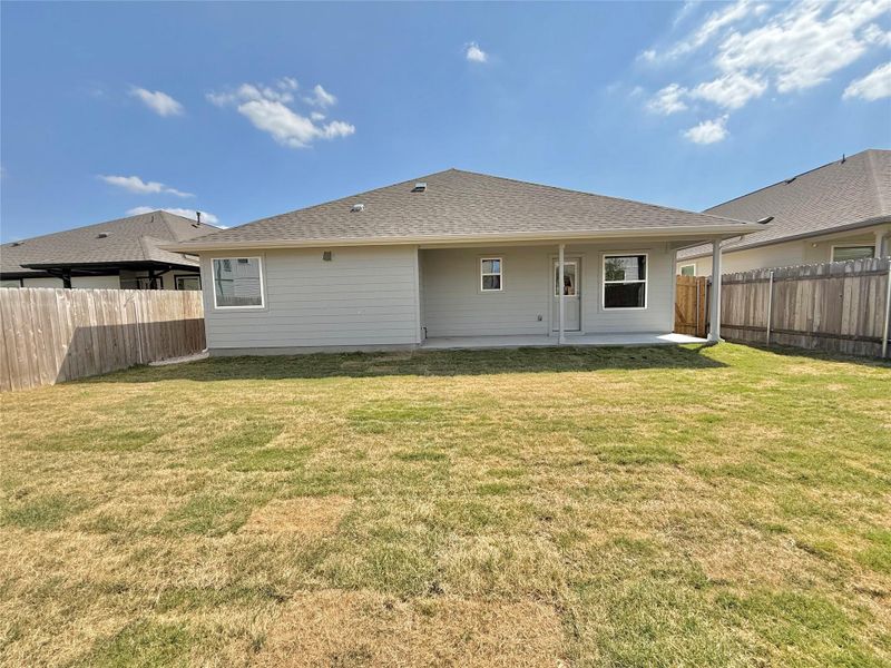 Exterior details and patio area of a home in Porter Country, Buda (Image 3).