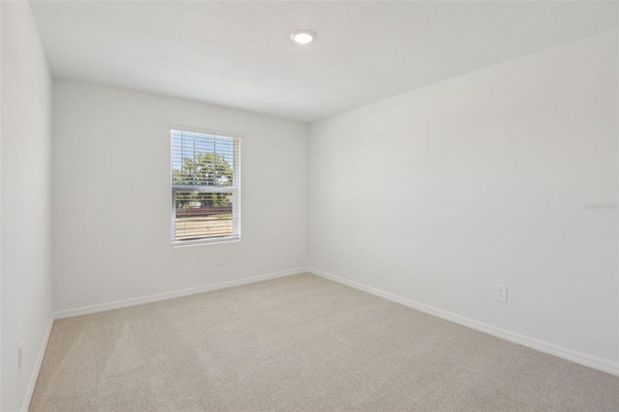 Spacious, unfurnished interior of a new home in Hilltop Vistas, Dade City (Image 33).