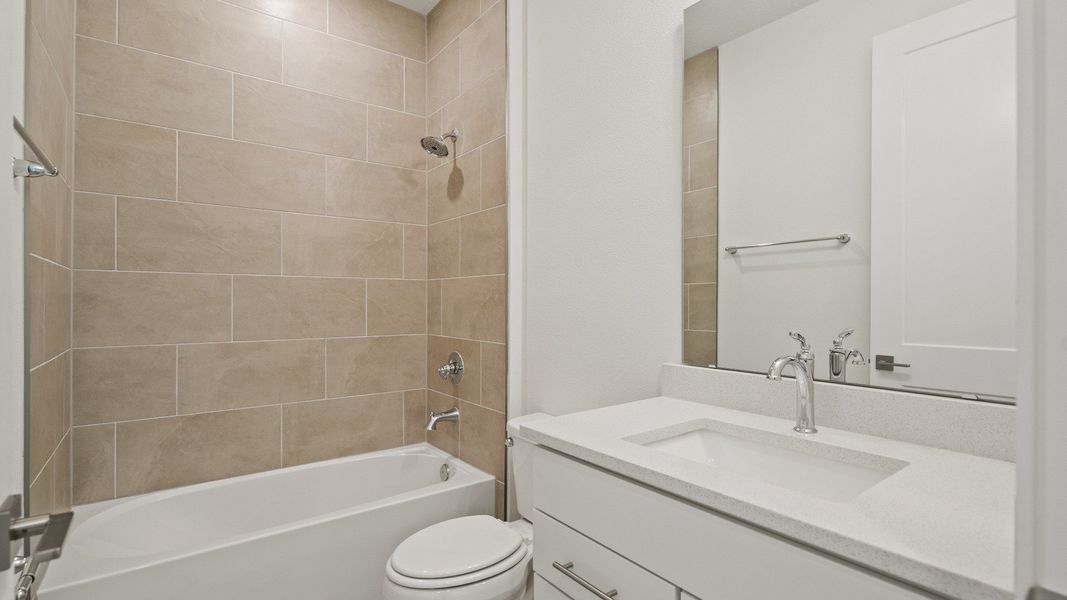 Full Bathroom in the Buttonwood floorplan by DRB Homes at Lakeside at Satilla in Saint Cloud, FL