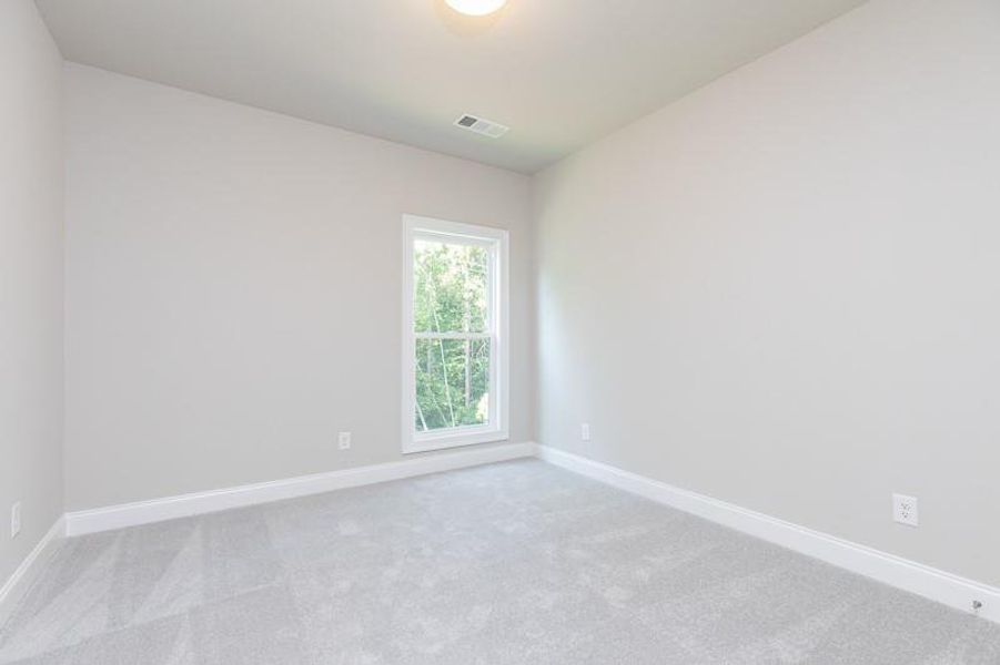 Spacious, unfurnished interior of a new home in Waterhaven, Cumming (Image 24).