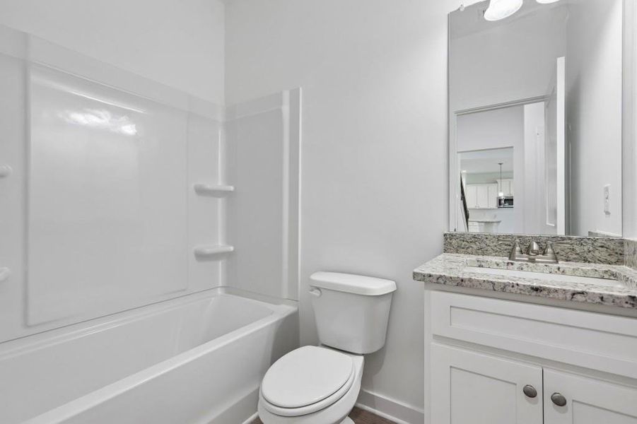 Furnished interior view inside a new home in Savoy Park, Covington (Image 5).