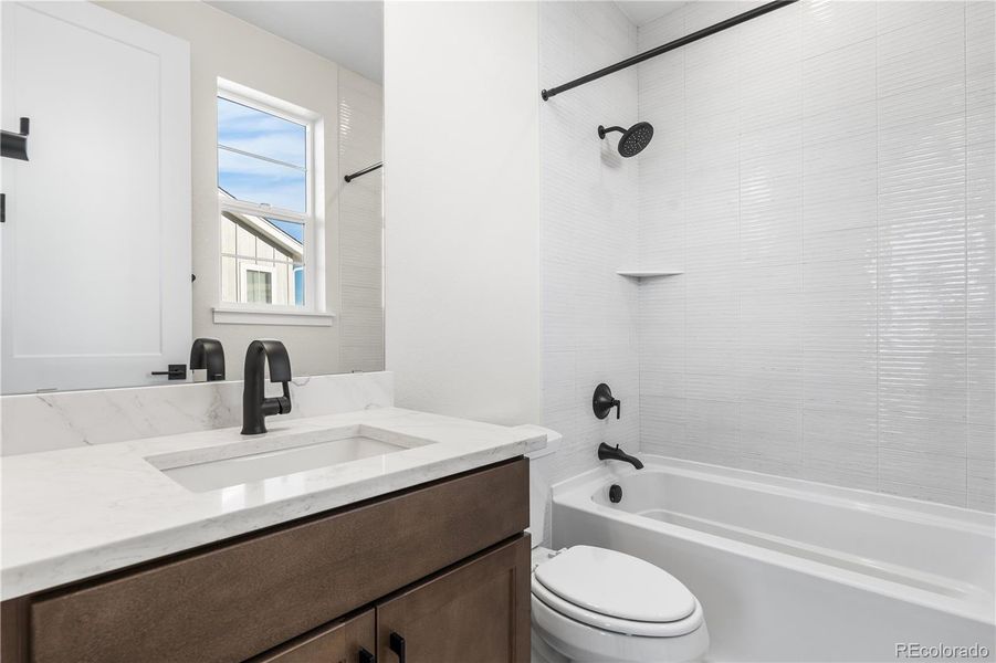 Furnished interior view inside a new home in Luxe at The Canyons, Castle Pines (Image 6).