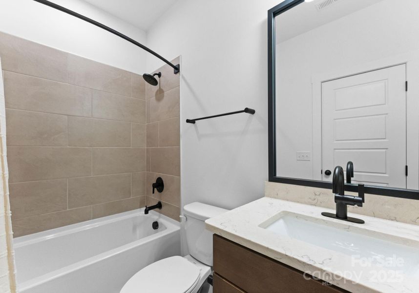 Photo is of model home in community, finishes may vary