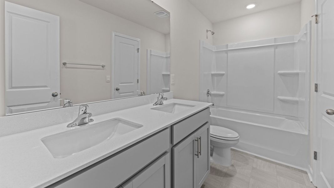 Furnished interior view inside a new home in East Ridge, Ayden (Image 9).