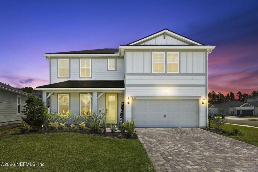 Front exterior of a new home in Double Branch, Middleburg, FL, highlighting curb appeal (Image 28). Front exterior of a new home in Double Branch, Middleburg, FL, highlighting curb appeal (Image 28).