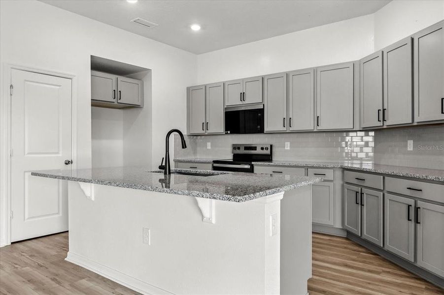 Furnished interior view inside a new home in Reserve at Forest Lake II, Lake Wales (Image 10). Furnished interior view inside a new home in Reserve at Forest Lake II, Lake Wales (Image 10).