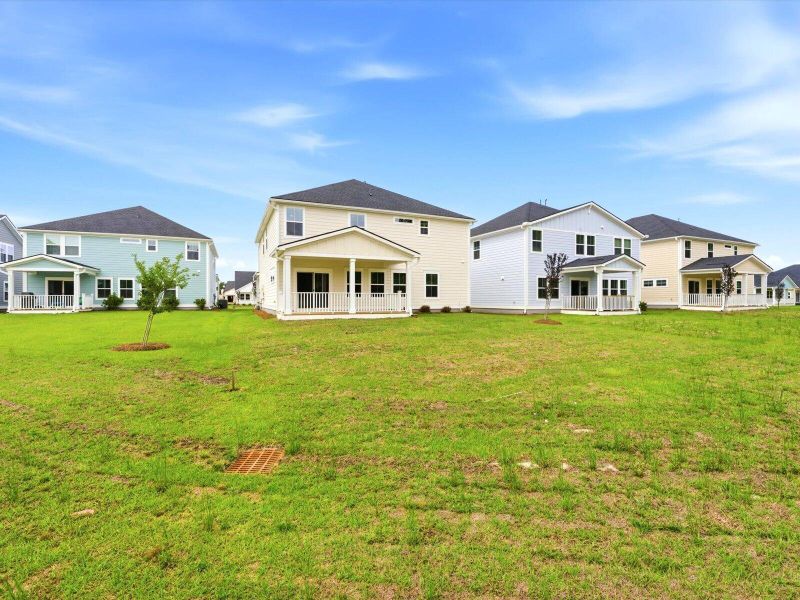 Exterior details and patio area of a home in The Coves at Lakes of Cane Bay, Summerville (Image 20).