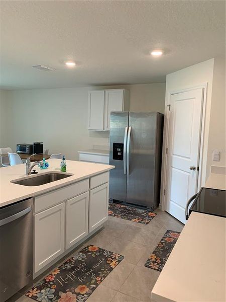 Furnished interior view inside a new home in Sunset Hills, Summerfield (Image 5).
