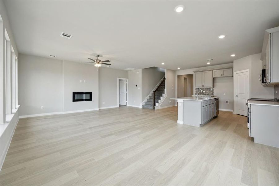 Here you can see the electric fireplace and the open floor plan