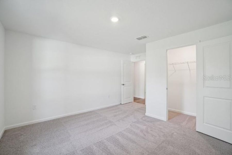 Spacious, unfurnished interior of a new home in Royal Highlands, Weeki Wachee (Image 21).