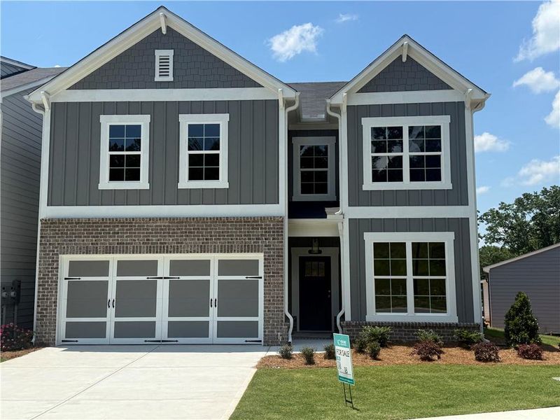 Front exterior of a new home in Lakeside at Great Sky, Canton, GA, highlighting curb appeal (Image 2).