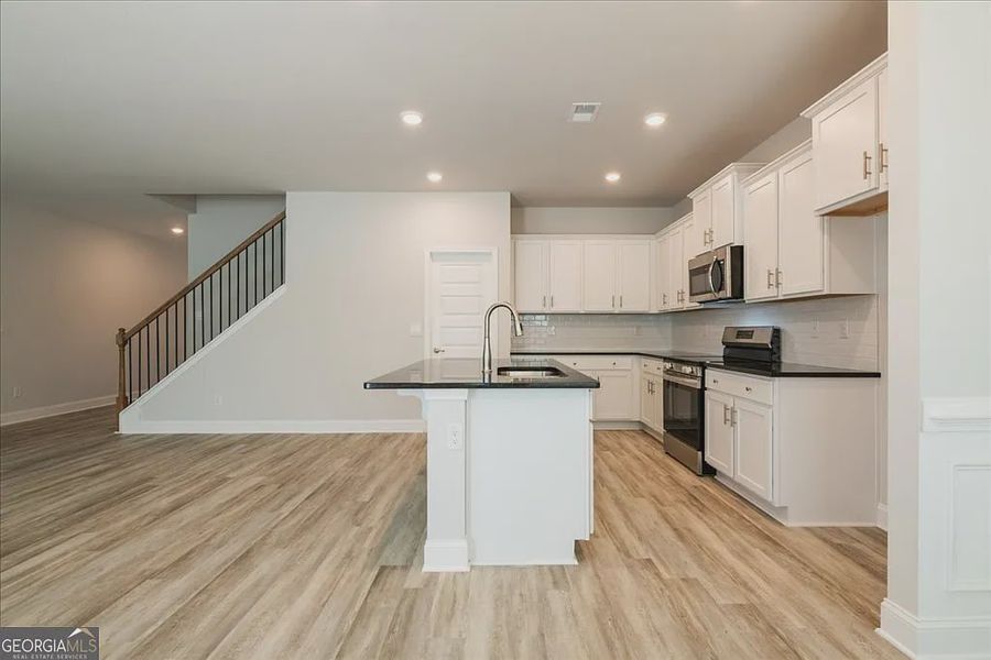 Furnished interior view inside a new home in Oakview Estates, Macon (Image 7).
