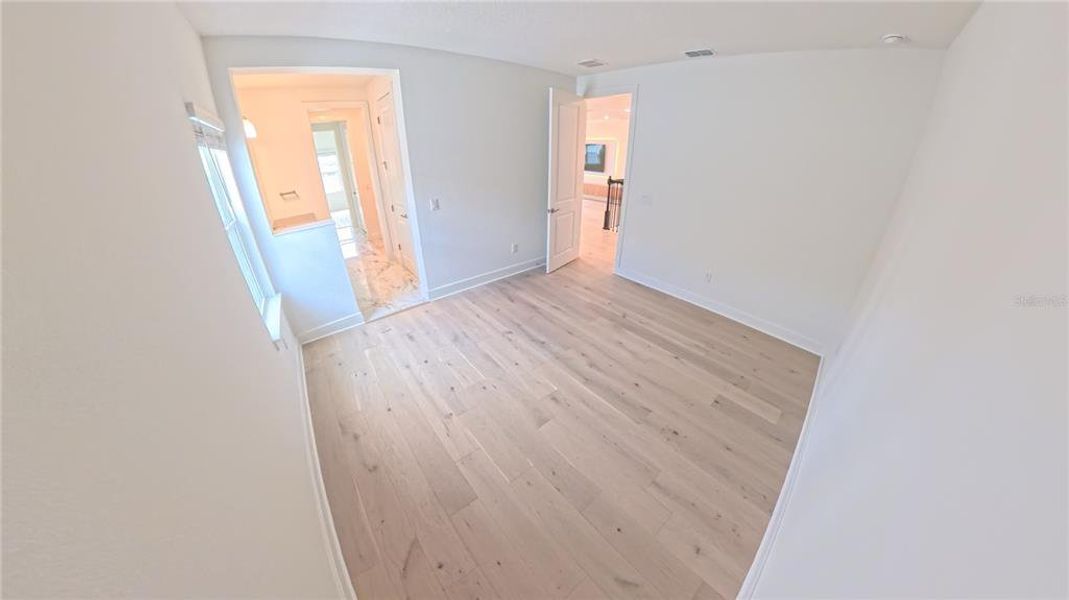 Spacious, unfurnished interior of a new home in Willow Ridge, Montverde (Image 27).