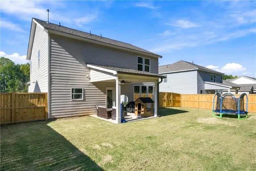 Exterior details and patio area of a home in Sutton’s Landing, Statham (Image 21).