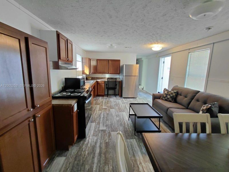 Furnished interior view inside a new home in , Clewiston (Image 4).