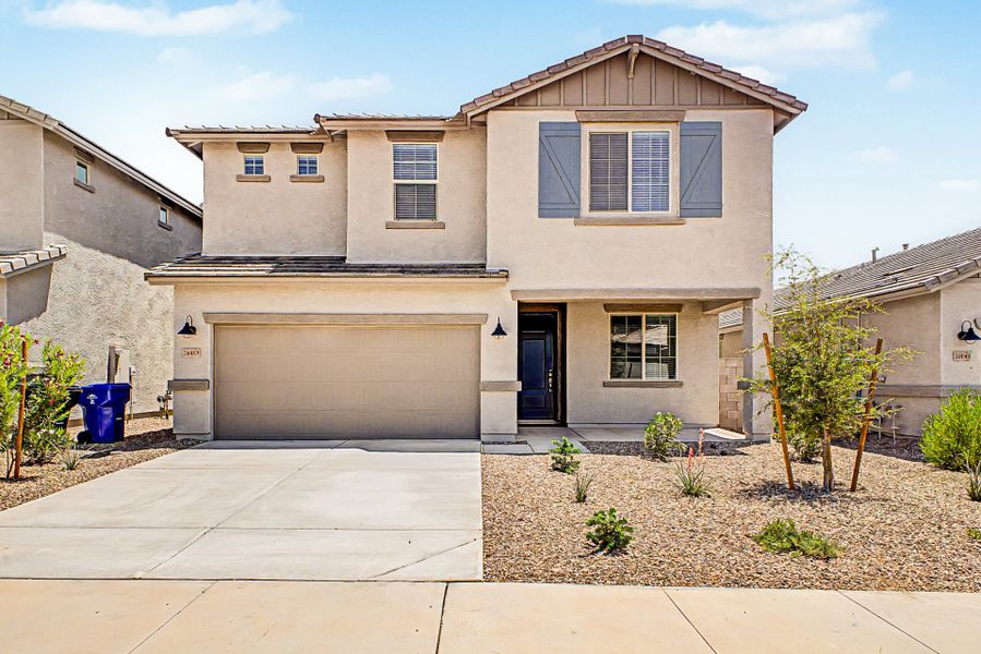 Front exterior of a new home in Sunrise, Surprise, AZ, highlighting curb appeal (Image 1). Front exterior of a new home in Sunrise, Surprise, AZ, highlighting curb appeal (Image 1).