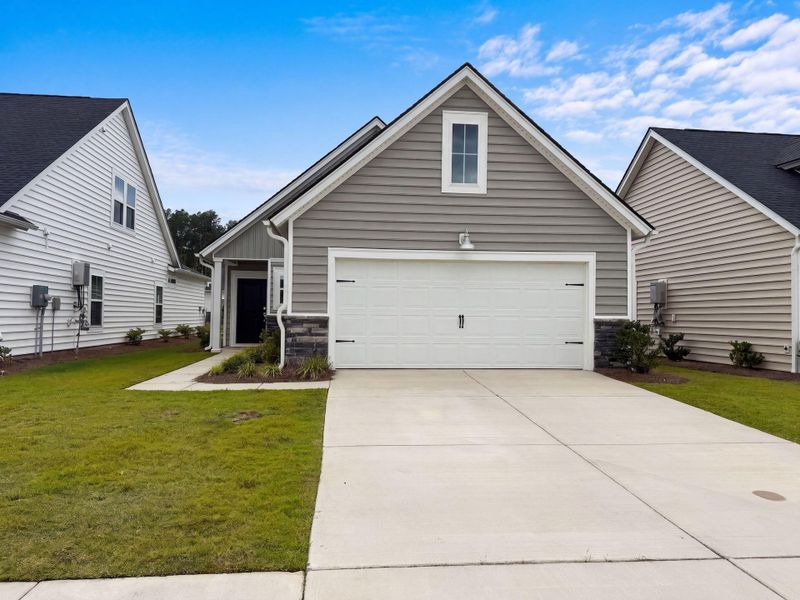 Front exterior of a new home in , Summerville, SC, highlighting curb appeal (Image 14).