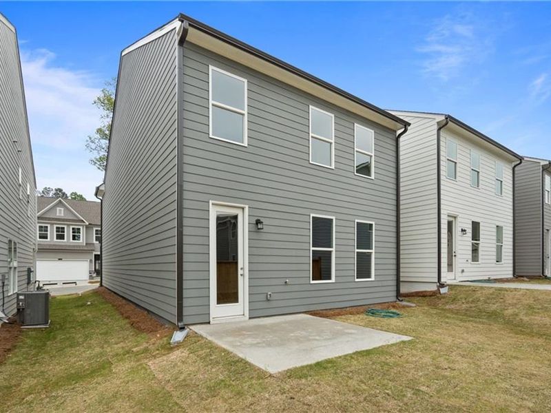 Exterior details and patio area of a home in The Village at Shallowford, Kennesaw (Image 19).