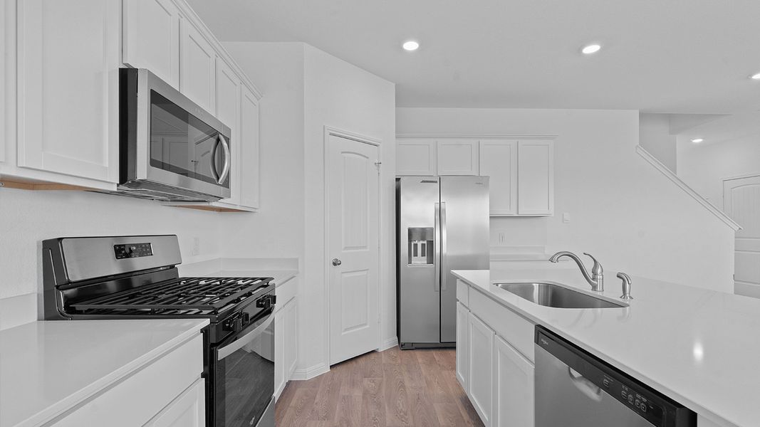 Furnished interior view inside a new home in Carillon, Manor (Image 4).