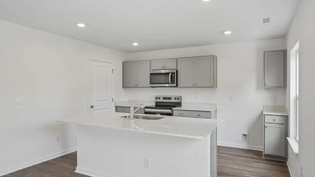 Furnished interior view inside a new home in Mangum Farms, Stem (Image 7).