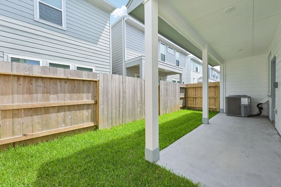 Exterior details and patio area of a home in Kemah Crossing - City Series, Kemah (Image 30).