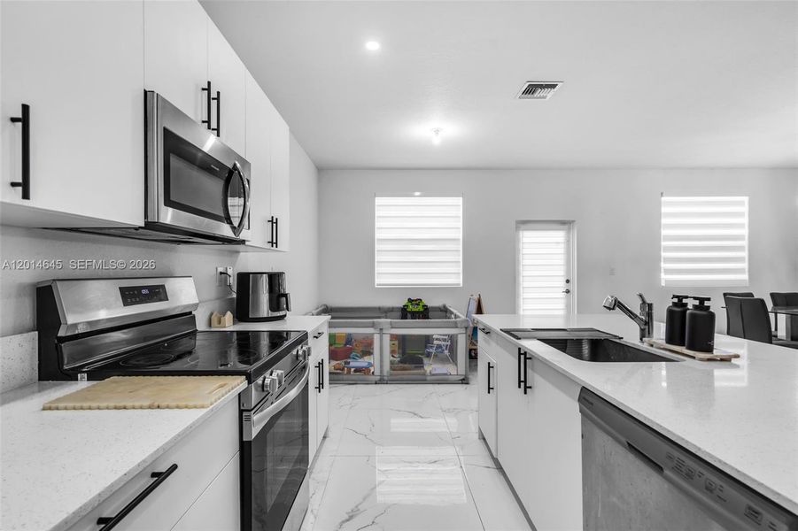 Furnished interior view inside a new home in , Miami (Image 10).
