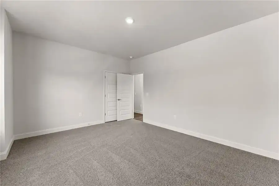 Representative unfurnished interior of a home built from the 1709 by Adams Homes in Ham Farm, La Grange (Image 20).