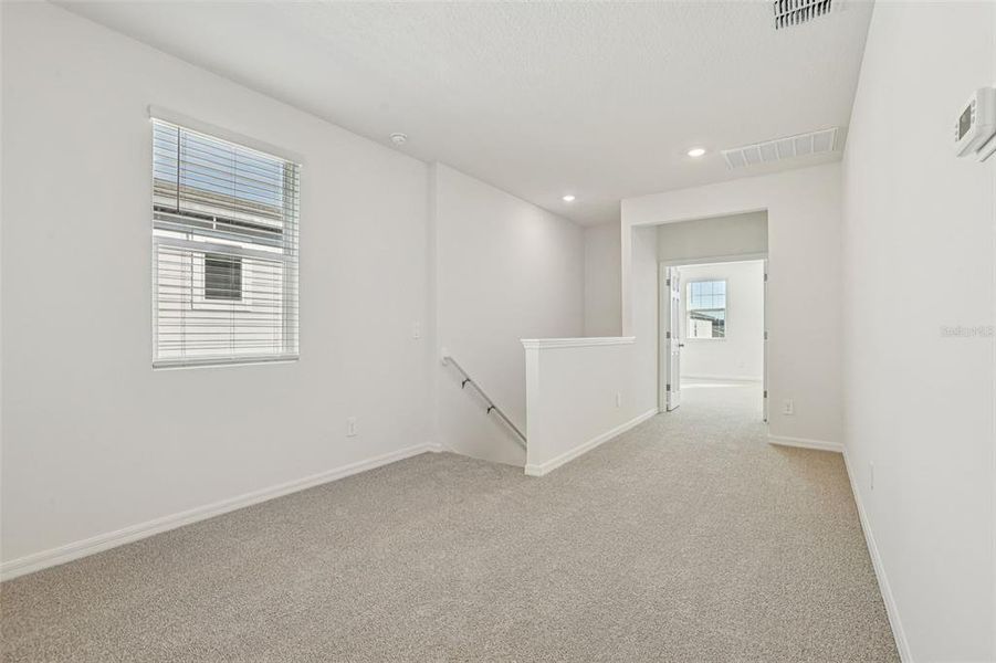 Spacious, unfurnished interior of a new home in The Meadow at Crossprairie Bungalows, St. Cloud (Image 26).