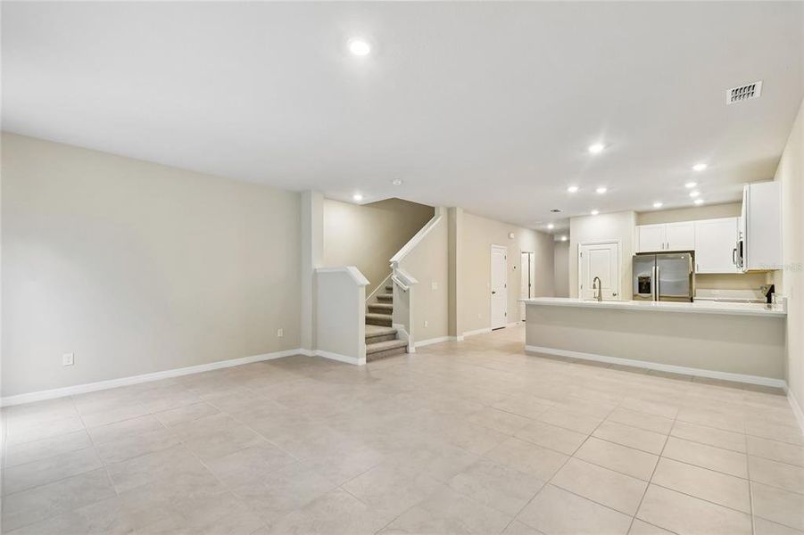 Spacious, unfurnished interior of a new home in Preserve at The Cays – The Harbor Series, Daytona Beach (Image 11). Spacious, unfurnished interior of a new home in Preserve at The Cays – The Harbor Series, Daytona Beach (Image 11).