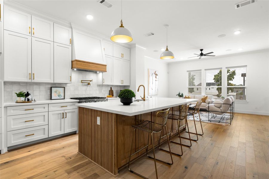 Open-concept kitchen and living area with a warm, inviting atmosphere.