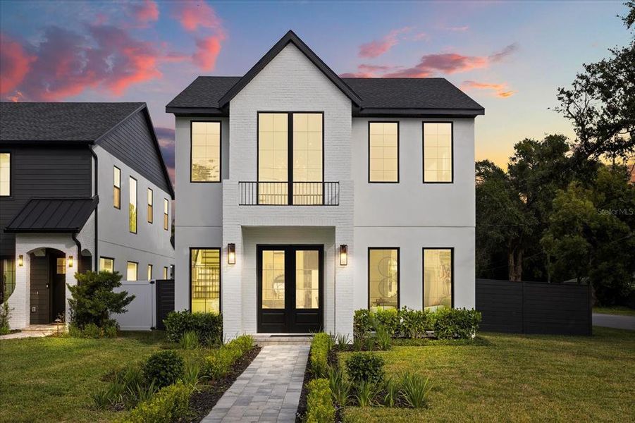 Front exterior of a new home in , Orlando, FL, highlighting curb appeal (Image 25).