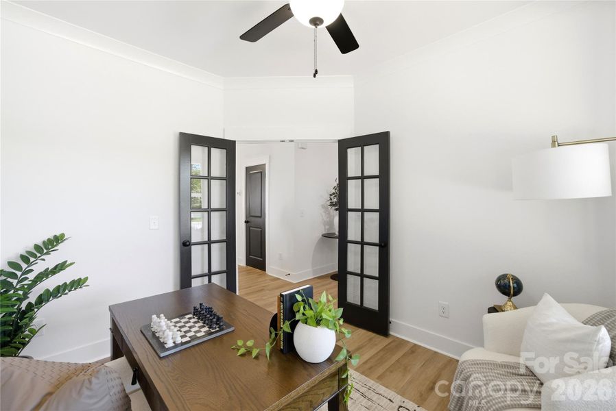 Dedicated home office with double doors, ideal for remote work, study, or a quiet retreat