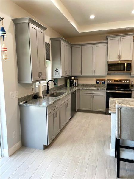 Furnished interior view inside a new home in , Port Charlotte (Image 42). Furnished interior view inside a new home in , Port Charlotte (Image 42).